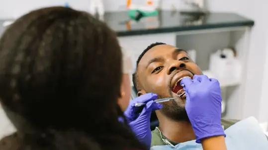 dental patient receiving a check-up